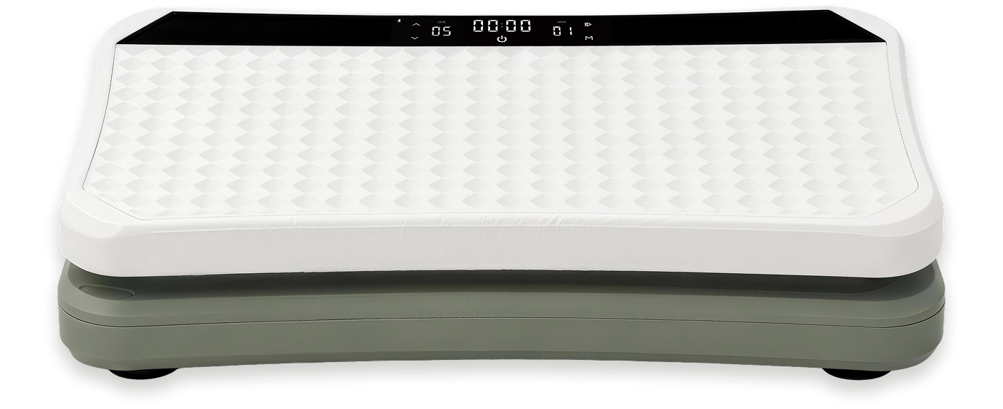 Kiwii Move board with a white textured silicone surface and green vibration base